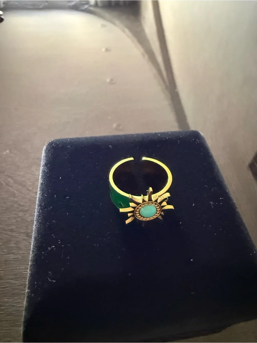 Gold-Tone Sunburst Ring with Green Stone